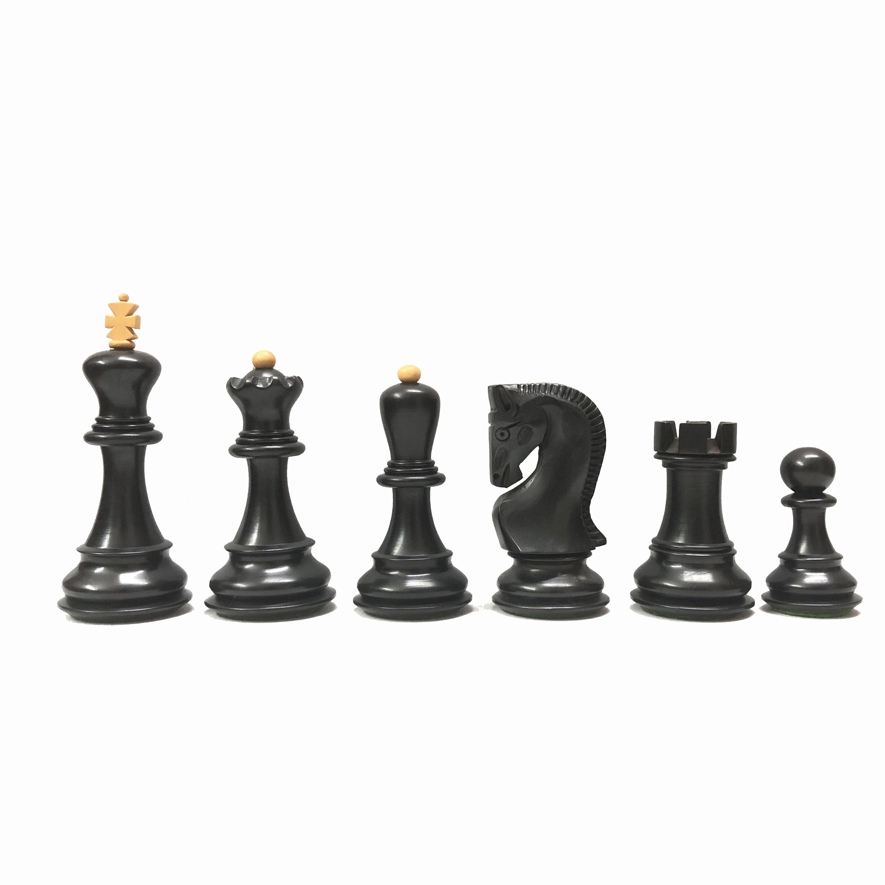 Ebonized chess pieces showcasing king, queen, knight, rook, and pawn designs; elegant and luxurious.