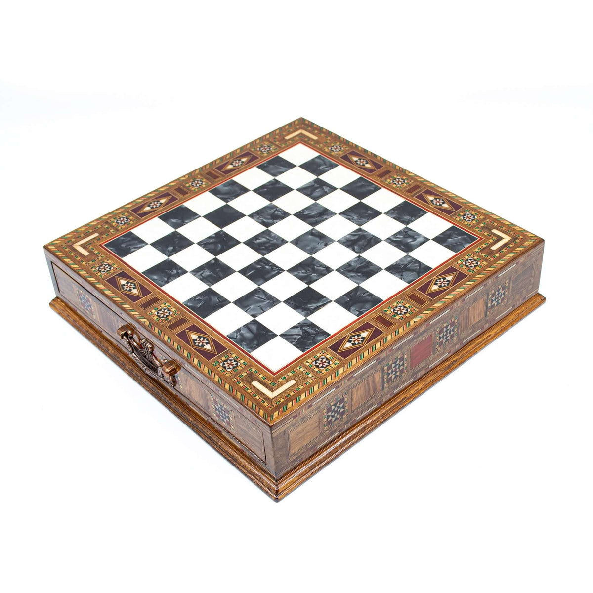Elegant wooden chess board with a black and white checkered pattern and intricate decorative edges.