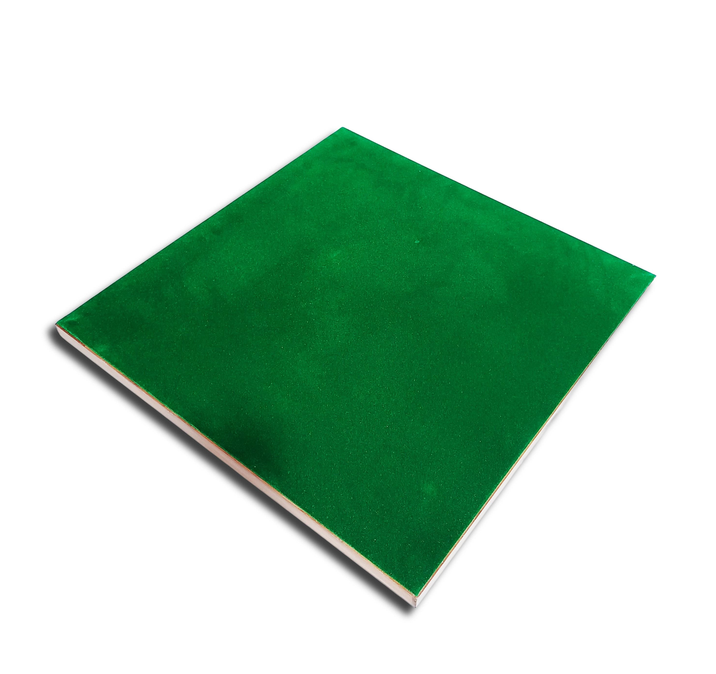 Green velvet underside of a luxury wooden chess board for protection and a sophisticated look.
