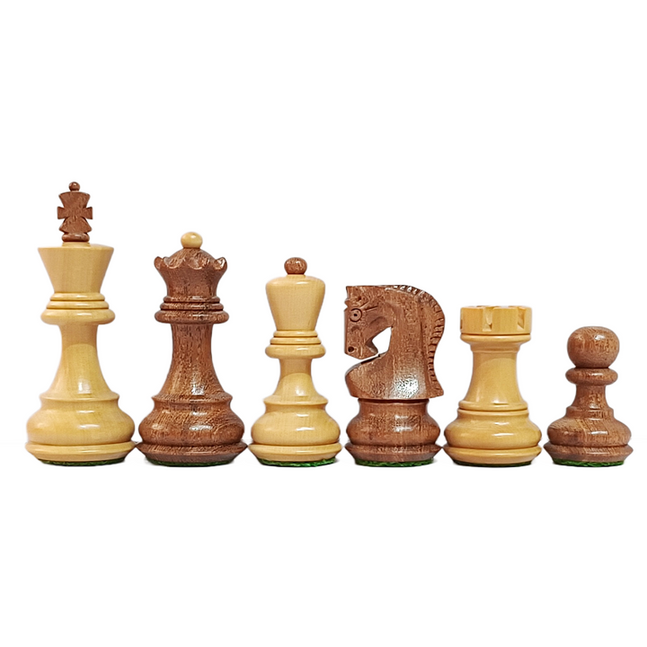 Set of wooden chess pieces on a white background