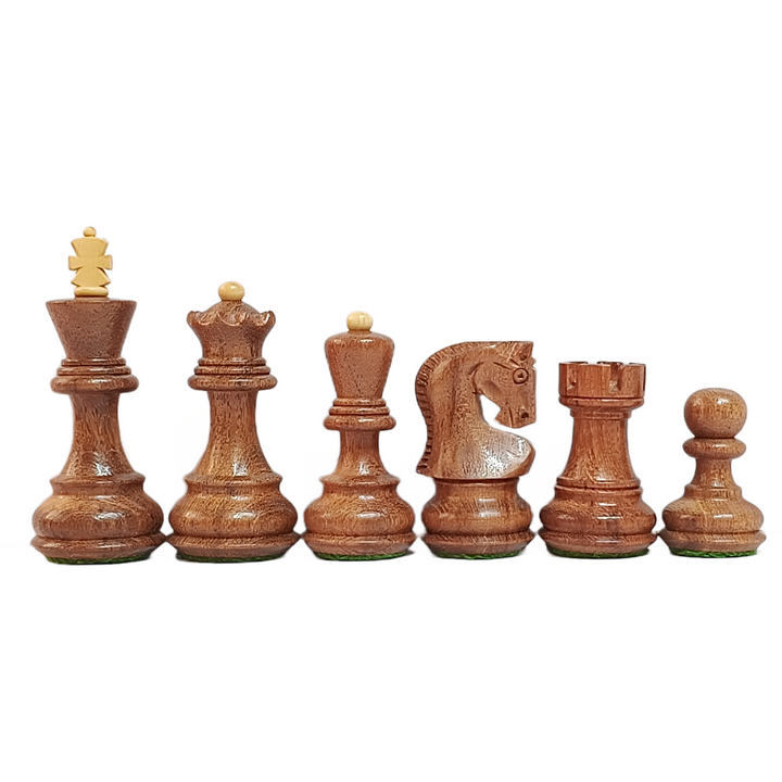 Set of wooden chess pieces on a white background