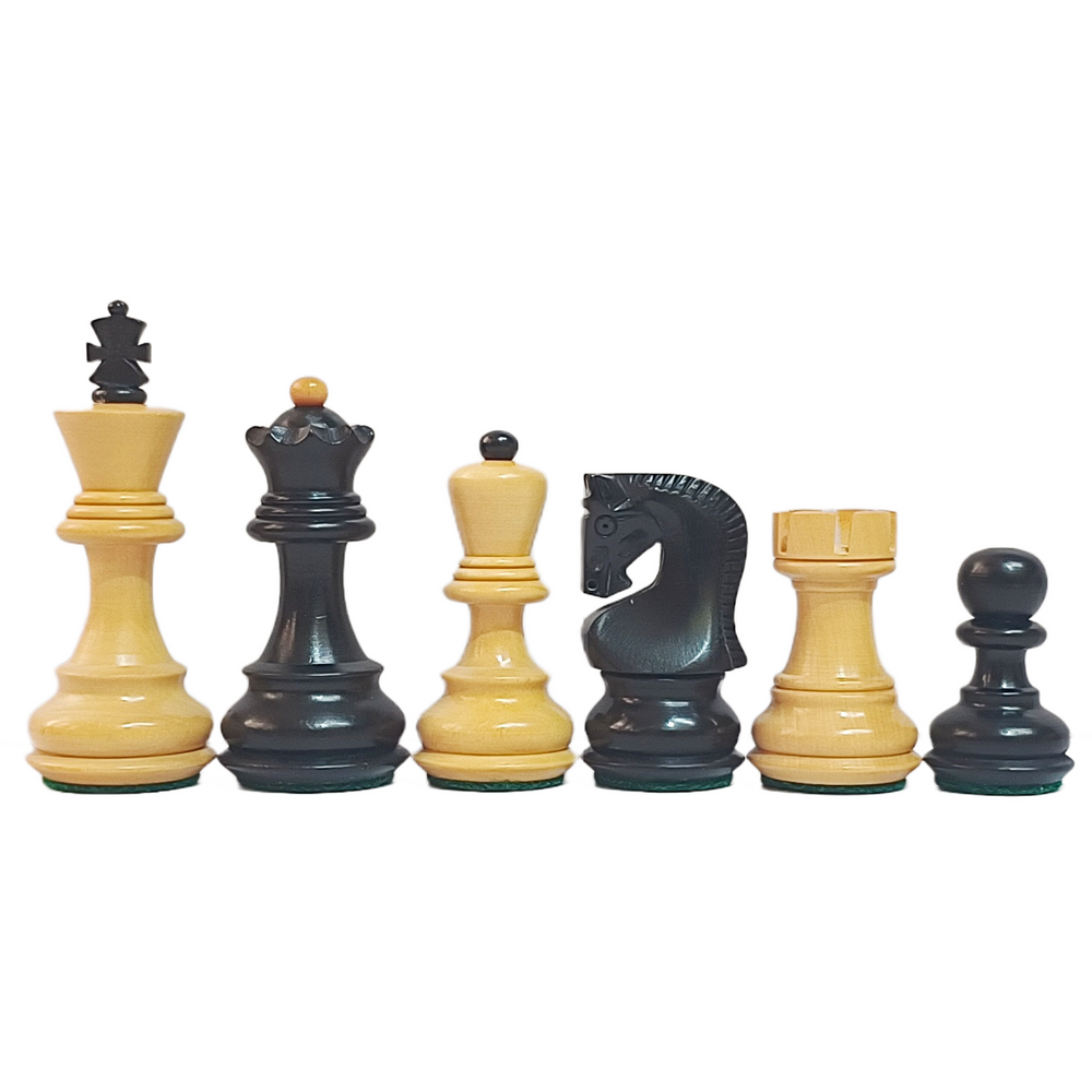 Set of black and yellow chess pieces on a white background