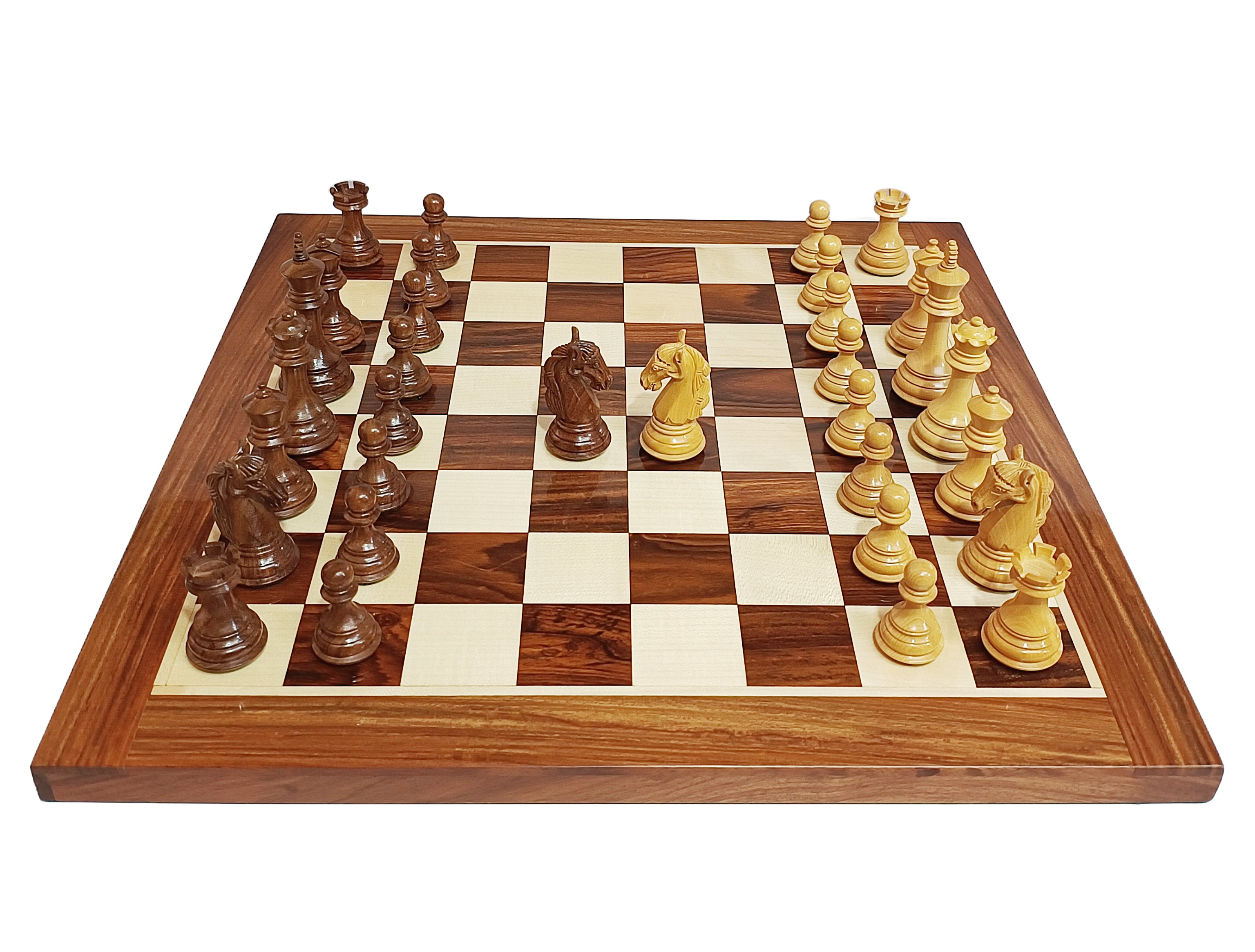 Colombian Staunton chess set on a golden rosewood board featuring boxwood and dark wooden pieces.